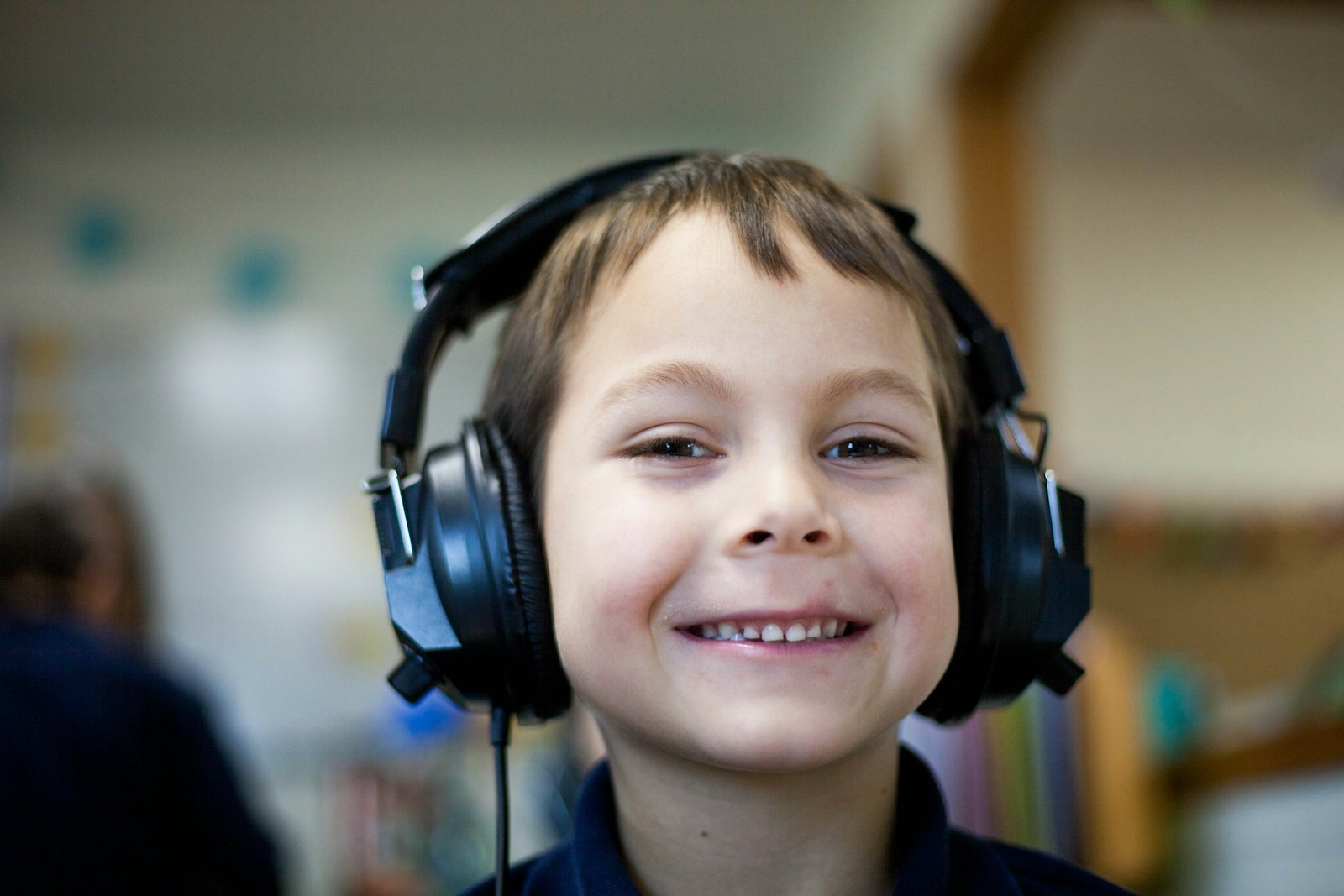 Happy student learning with headphones